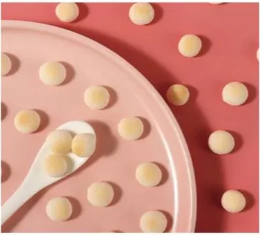 Homimi tamago boro mini biscuits on a pink plate with a spoon